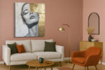Female portrait in grey linework and warm gold panels, contemporary mixed-media canvas art for living room or home office