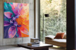 Swirling fluid-pour flower in magenta, orange, and teal, bold botanical digital art canvas for living room
