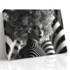 Female figure with spiral curly hair in black and white digital art portrait canvas for living room or home office