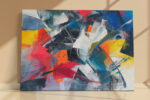 Explosive abstract acrylic painting in vivid red, cobalt blue, and near black, bold wall art canvas for living room