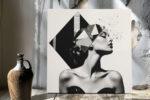Woman's profile with black diamond geometric shards and ink splatter, bold monochrome mixed-media canvas wall art