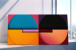 Two bisected circles on a color-block background in vivid orange, teal and deep purple u2014 bold geometric abstract wall art