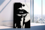 Extreme close-up of dark lips and fingers in monochrome chiaroscuro, bold portrait canvas for contemporary living room