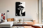 Extreme close-up of dark lips and fingers in monochrome chiaroscuro, bold portrait canvas for contemporary living room