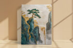 Embroidered pine tree on teal cliff with cascading waterfall in gold and ivory, japandi wall art canvas for bedroom