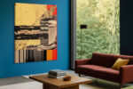 Coffee cup collage with barcode stripes and warm yellow panels, bold mixed-media wall art for industrial home office