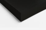 Extreme close-up portrait, vivid crimson lips on monochrome skin, bold high-contrast wall art for contemporary spaces