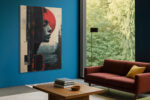 Woman's profile with vivid red halo and black geometric panels, moody mixed-media portrait canvas for living room