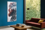 Bearded man's profile blended with snowy mountains, wolves and pine forest in deep red and charcoal digital art canvas