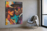 Two overlapping portrait faces in vivid teal, amber and red geometric acrylic style, bold contemporary wall art canvas