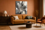 Woman's portrait emerging from monochrome patterned paper collage, bold mixed-media square wall art for living room