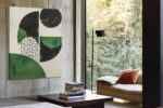 Bold abstract circles and cracked-cell pattern in near-black, warm off-white, and medium green u2014 contemporary canvas wall art