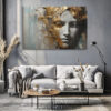 Sculptural face with gold leaf fragments and grey tones, dramatic mixed-media portrait canvas for living room