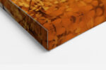 Birch tree trunks framing an autumn forest path in golden amber and burnt orange, acrylic landscape wall art canvas